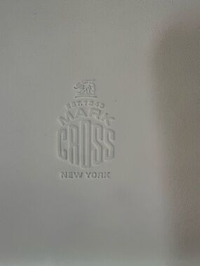 Mark Cross New York Embossed Logo Leather